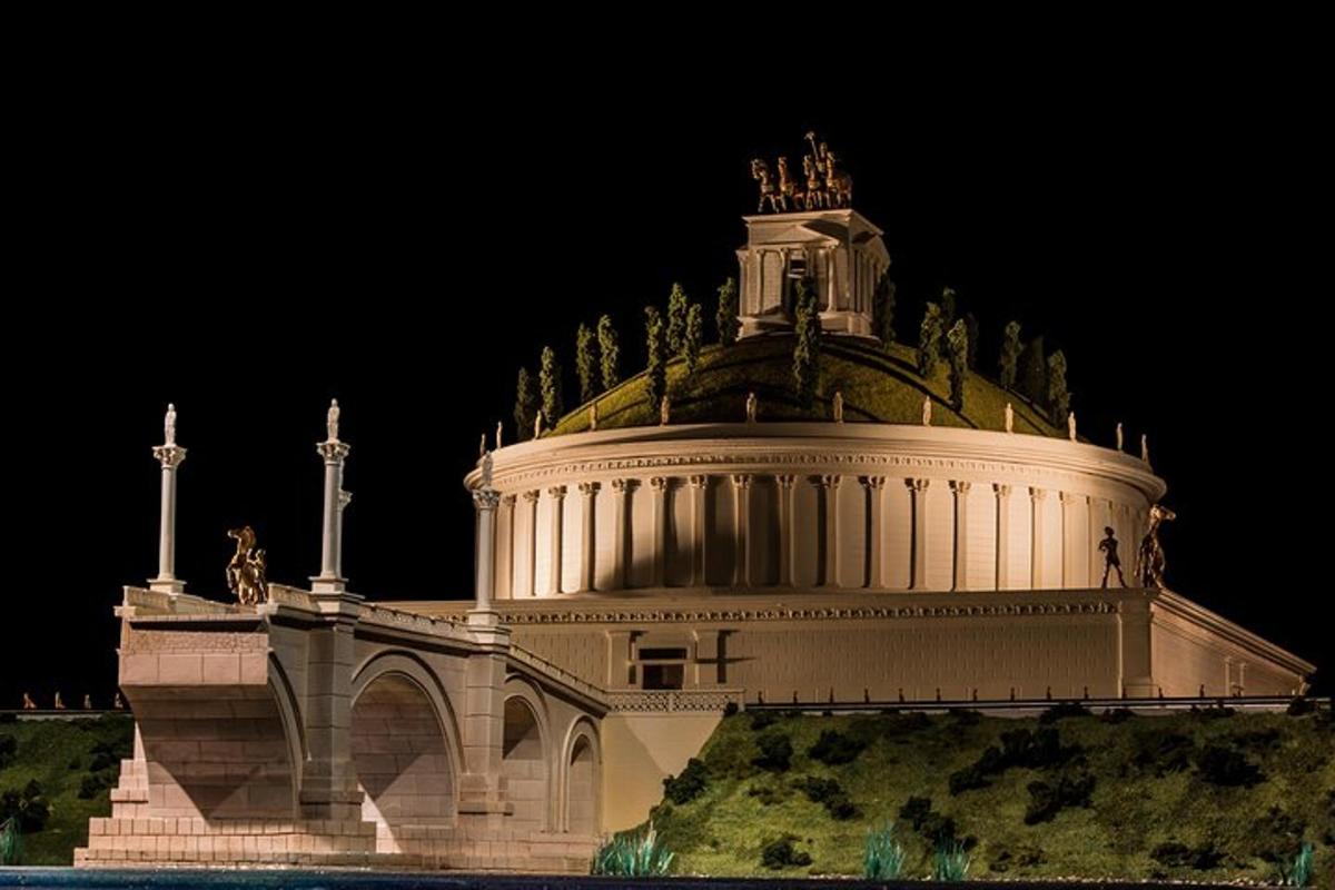 a large building with statues on top of it