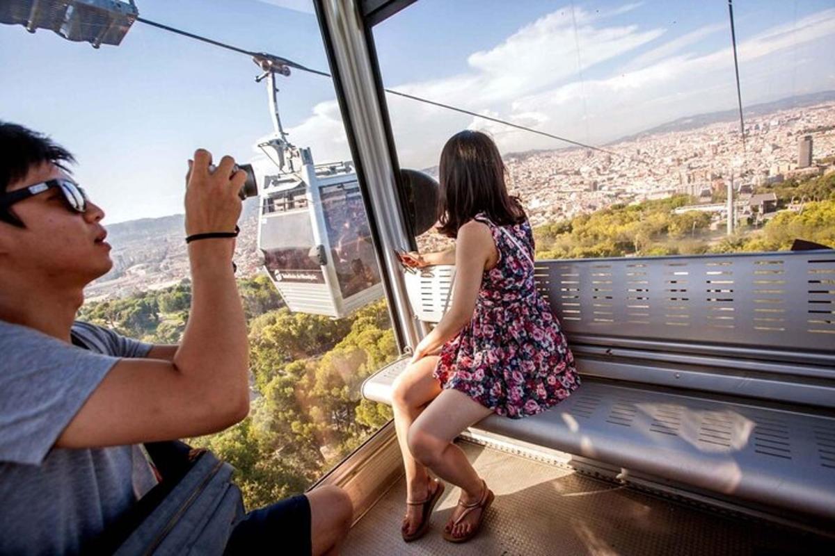 a man taking a picture of a girl on a roller coaster