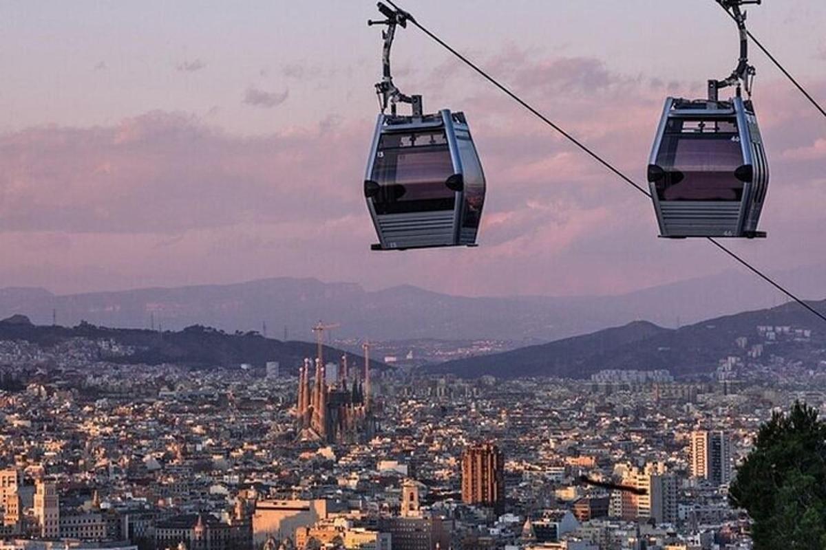 two cable cars flying over a city