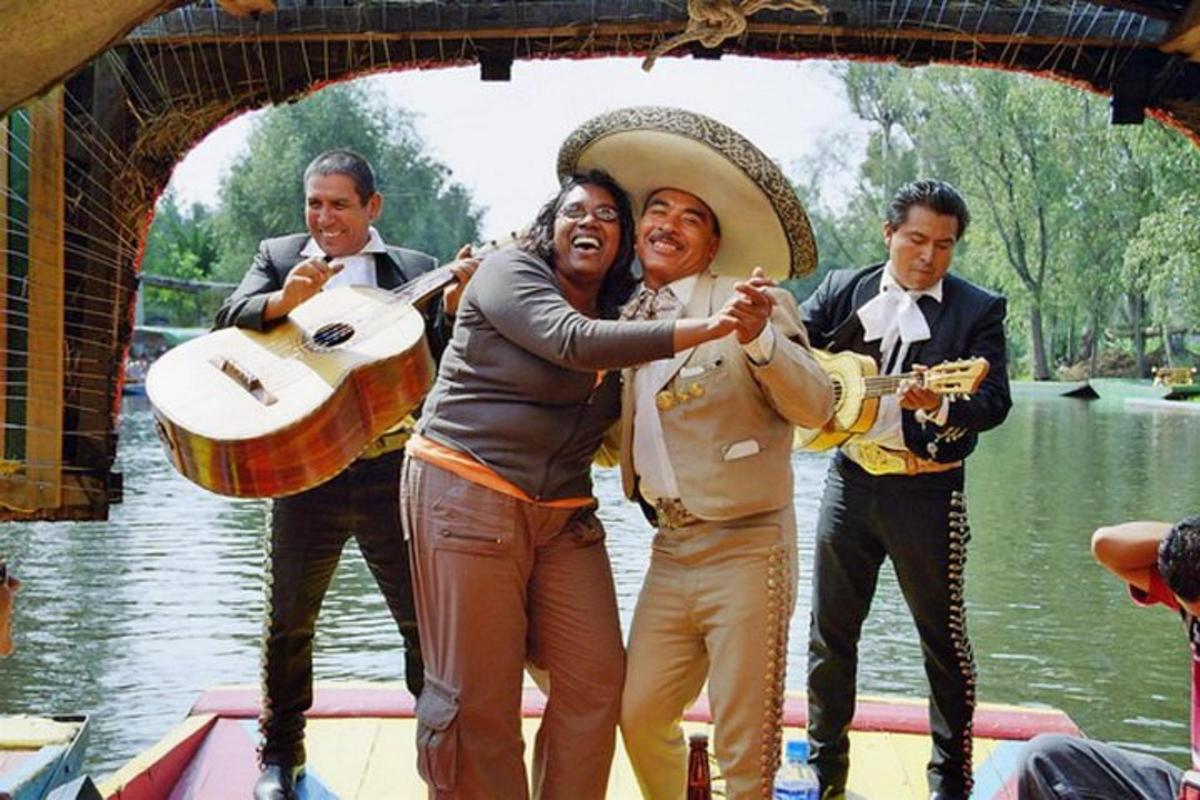a group of people playing music on a boat