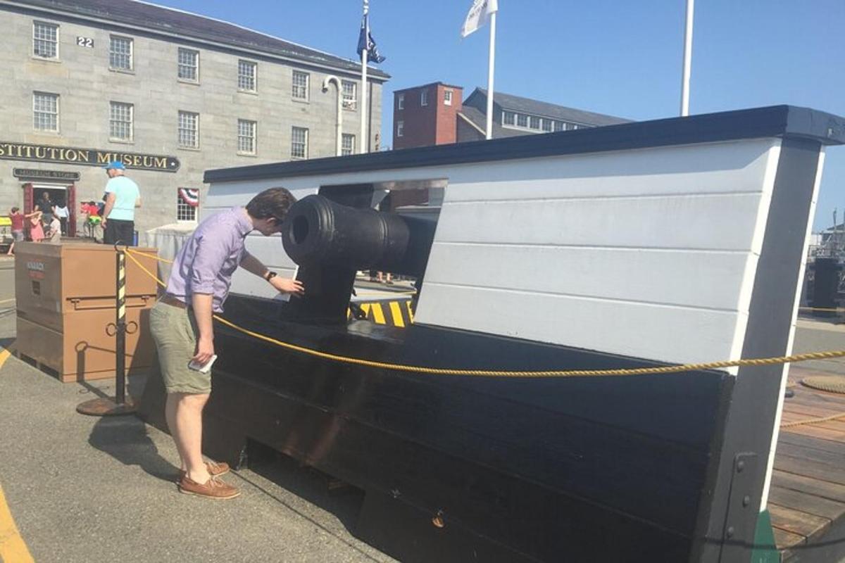 a man is looking into the back of a boat