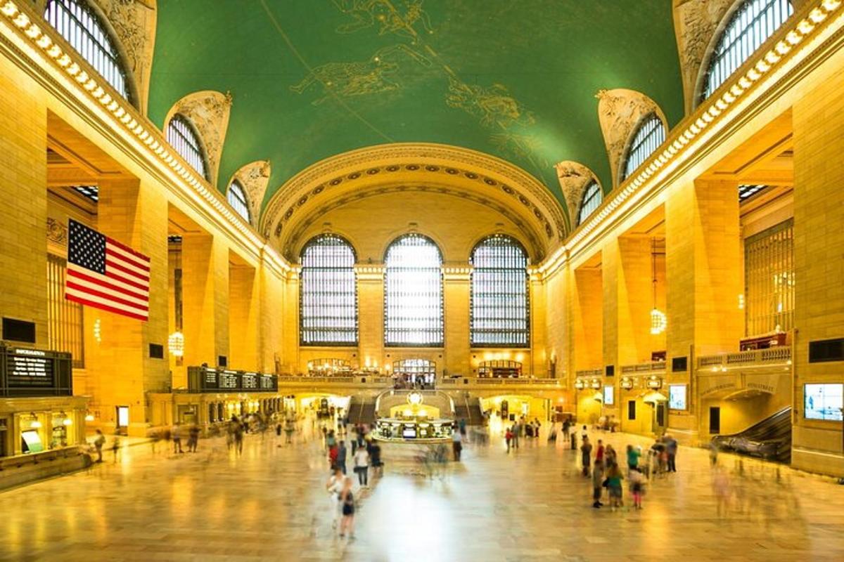 a large lobby with people walking in a building