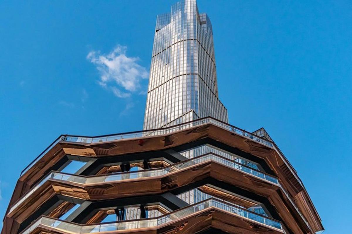 a tall building with a blue sky in the background