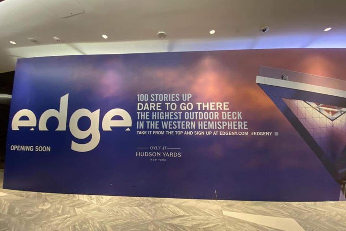 a sign for a stage in a room