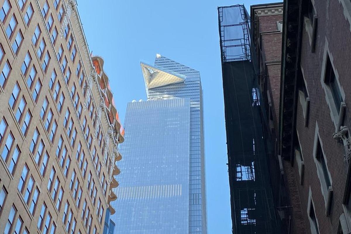 a view of two tall buildings in a city