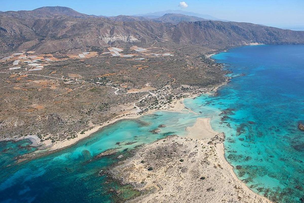 an aerial view of a beach and the ocean