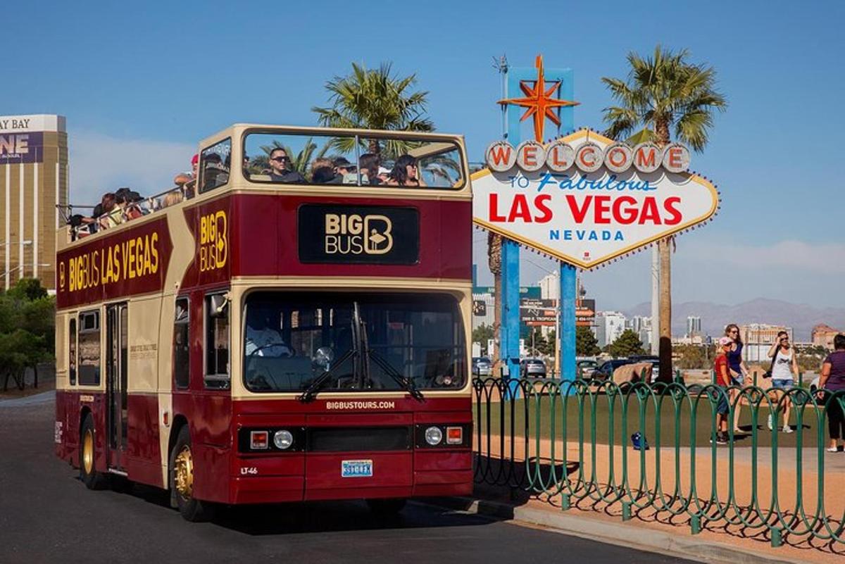 a double decker bus driving down a street