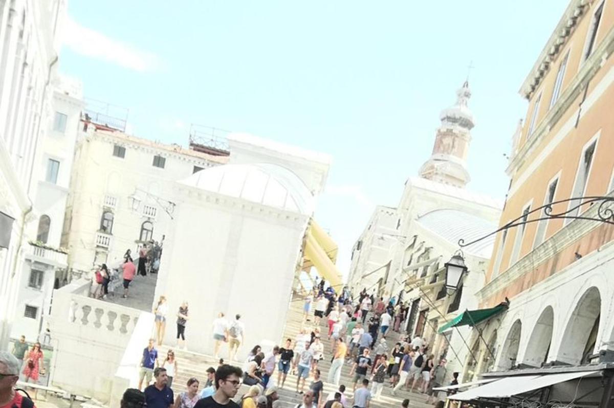 a group of people walking down a street