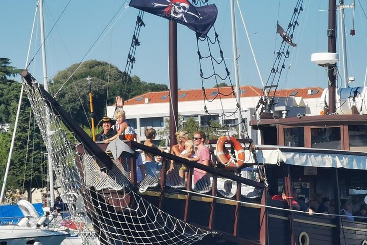 a group of people standing on a boat