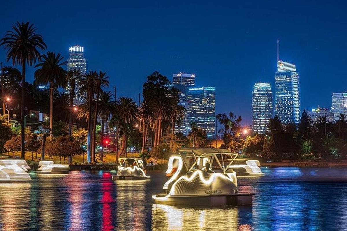 a boat in the water with a city in the background