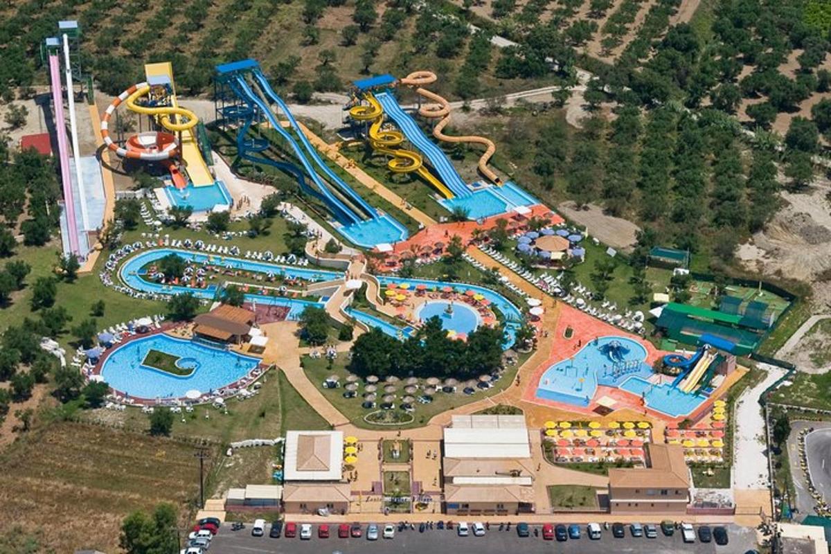 an aerial view of a water park with two pools