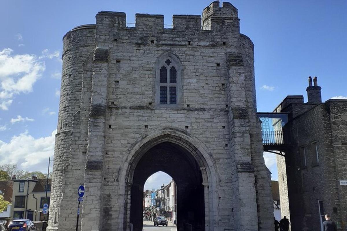 an old stone archway in a city