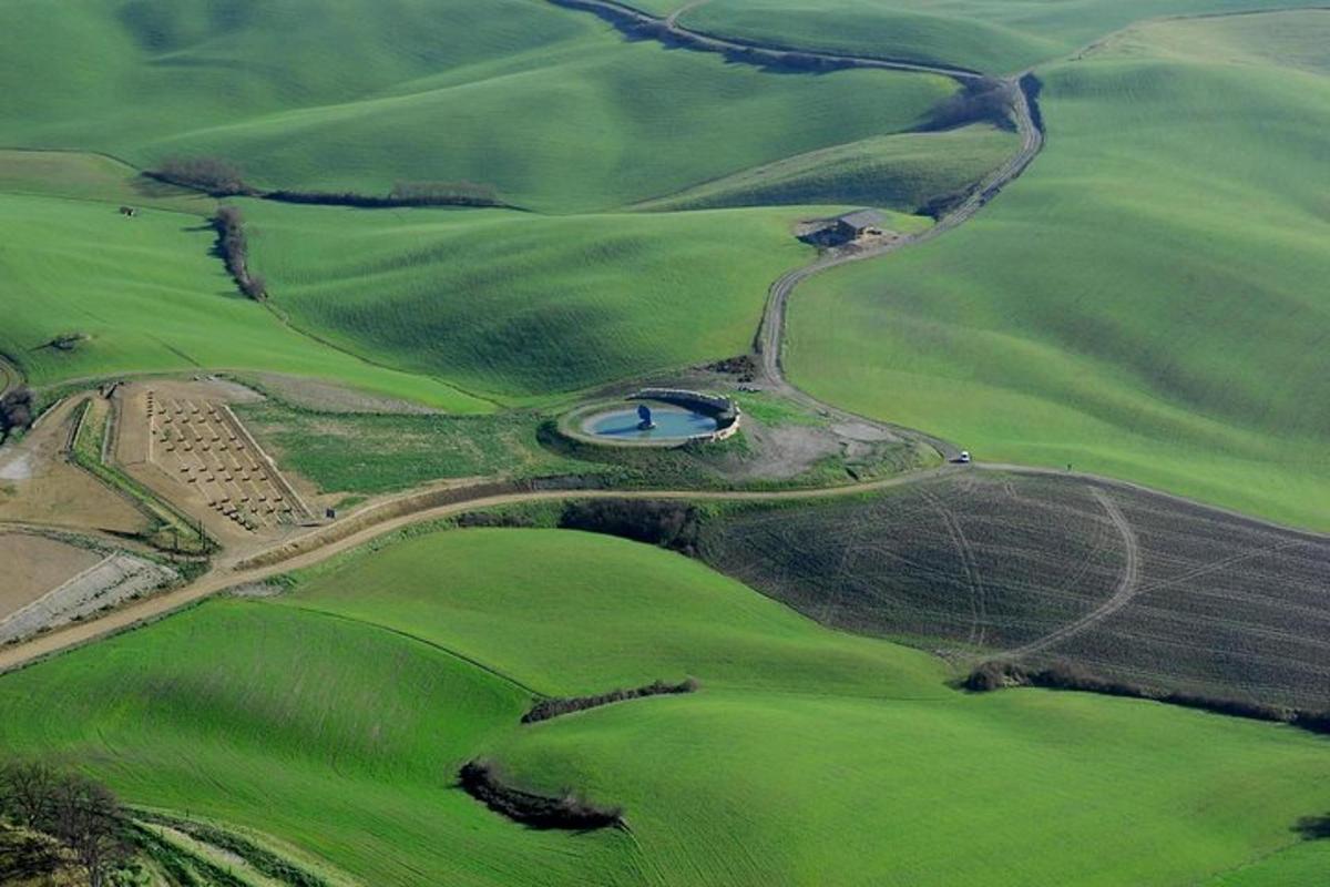an aerial view of a golf course in a field