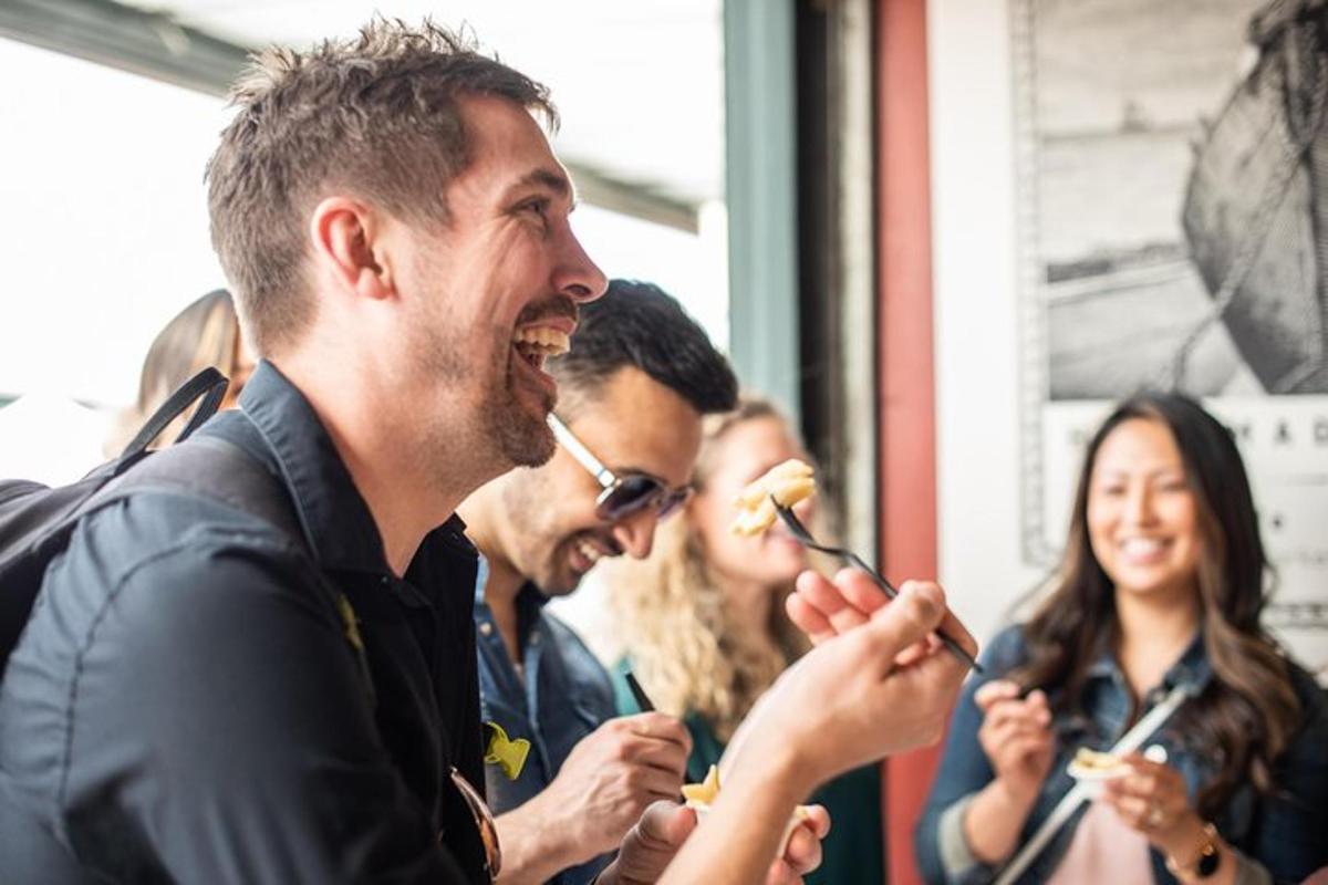 a group of people eating food on a bus