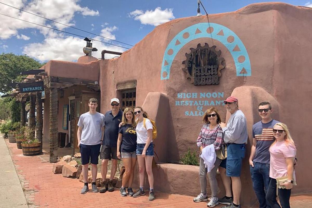 a group of people standing in front of a building