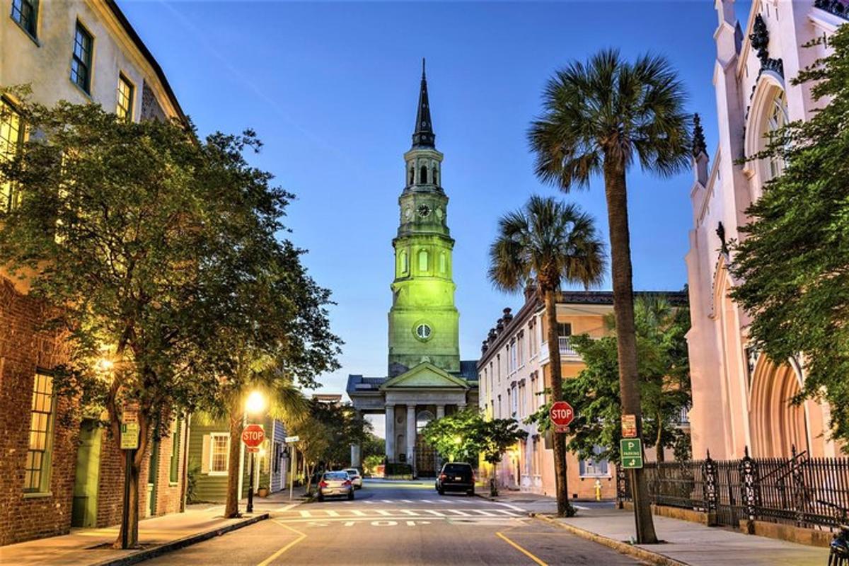 a church with a clock tower on a city street
