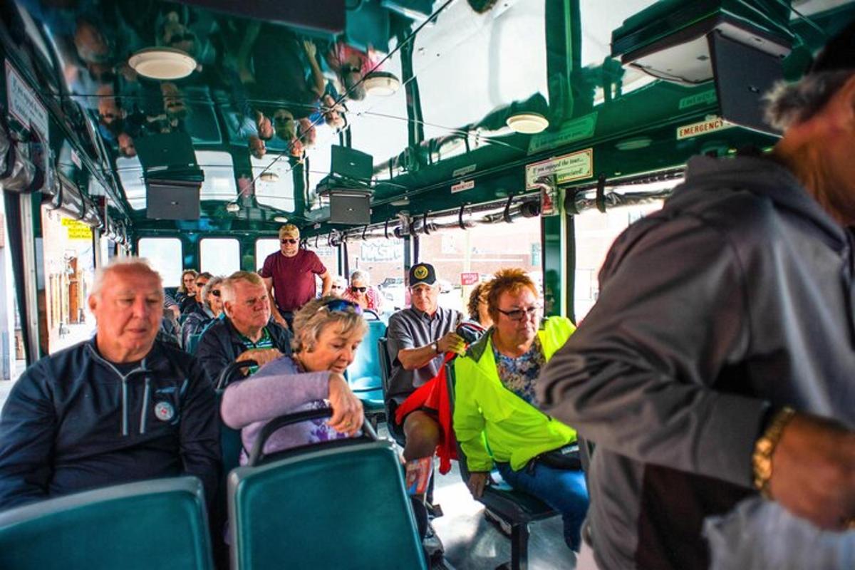 a group of people sitting on a bus