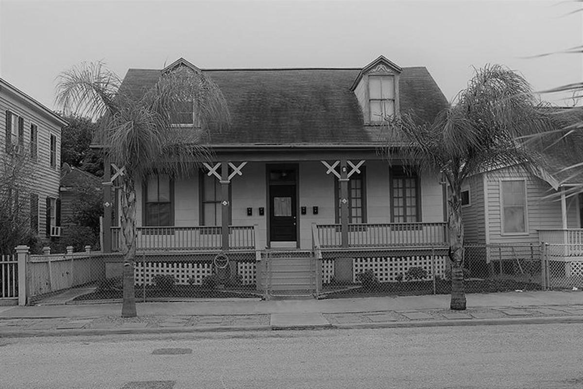 a black and white photo of a house