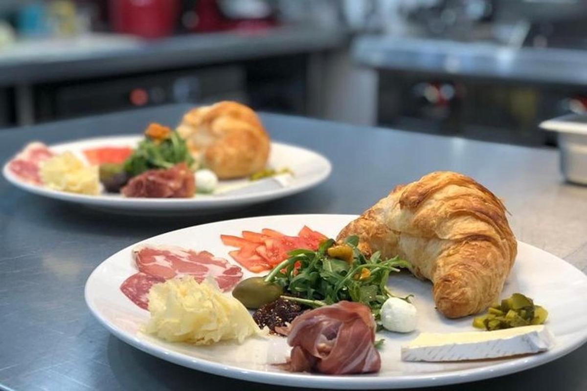 two plates of food on top of a table