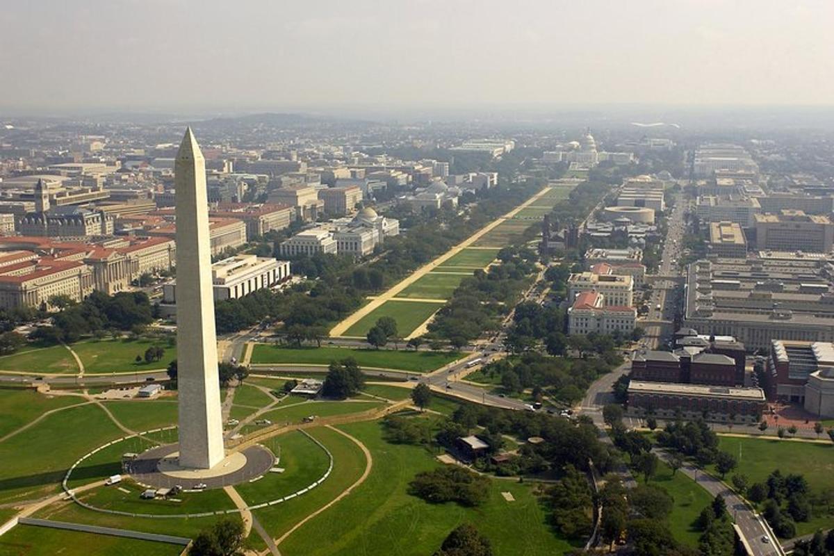 an aerial view of the washington monument in a city