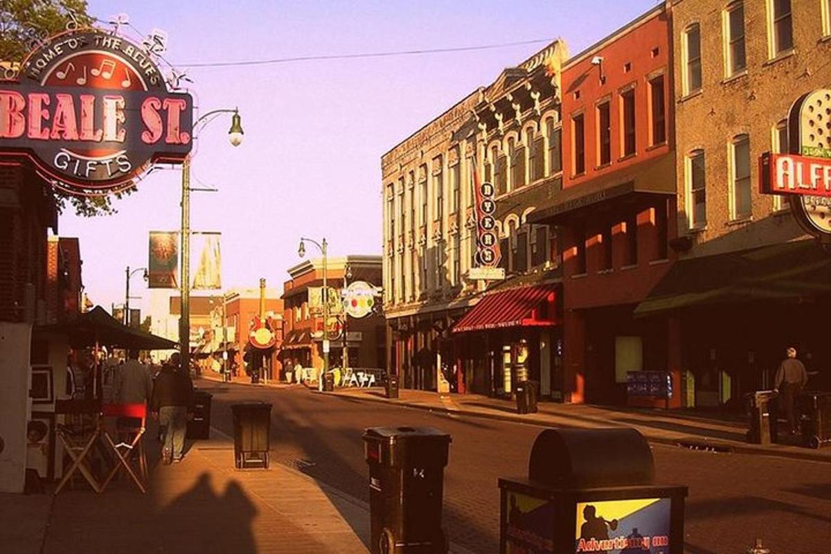 a city street with people walking down the street