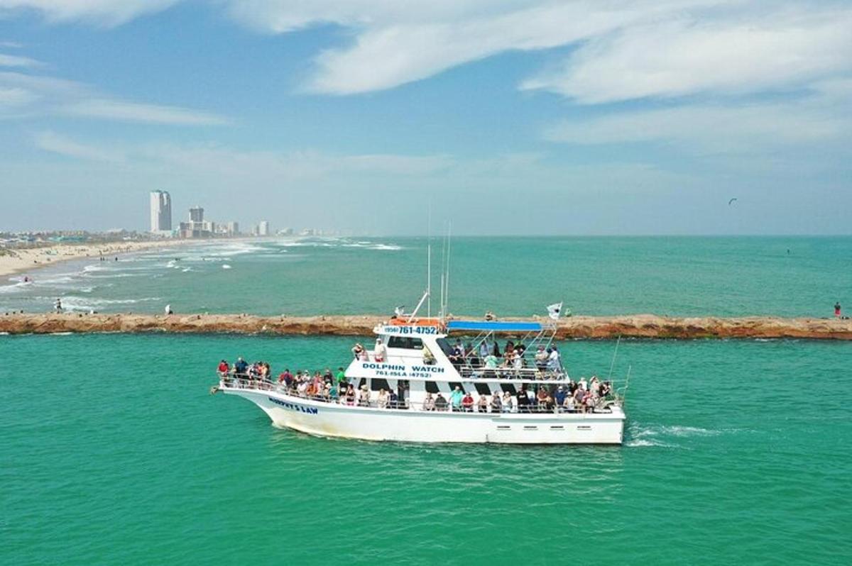 a group of people on a boat in the water