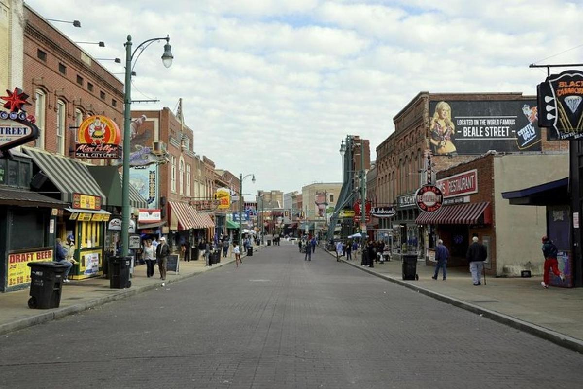 a city street with people walking down the street