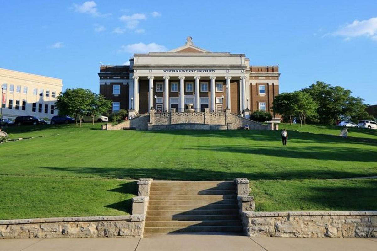 a large building with a staircase in front of it