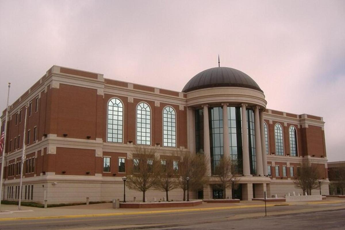 a large brick building with a dome on top of it