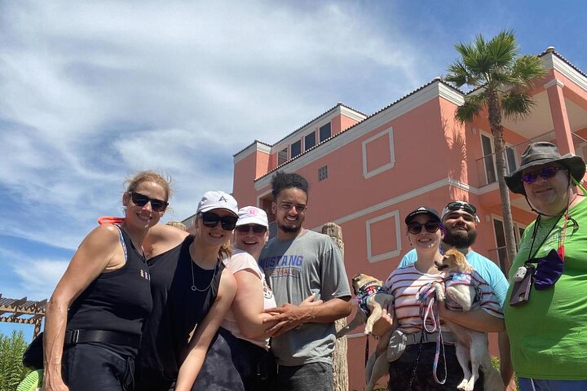 a group of people standing in front of a building