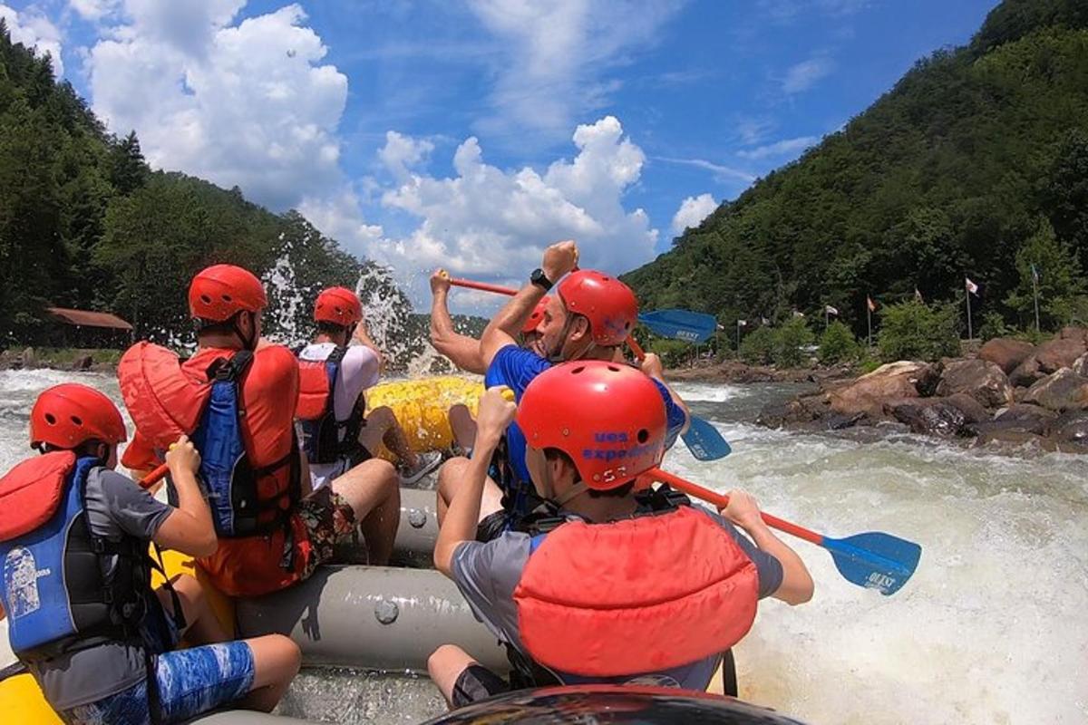 a group of people rafting on a river