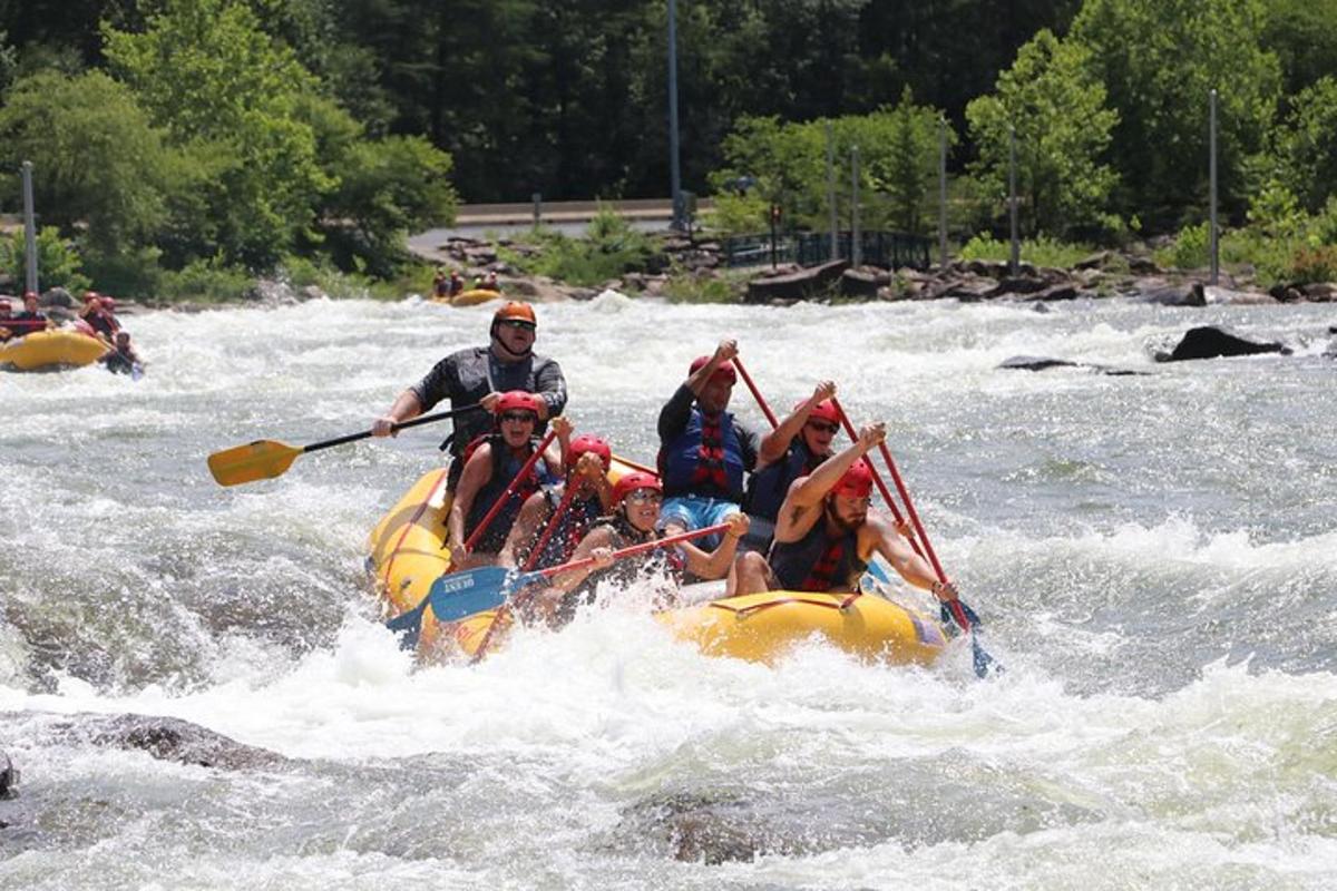 a group of people in a raft on a river