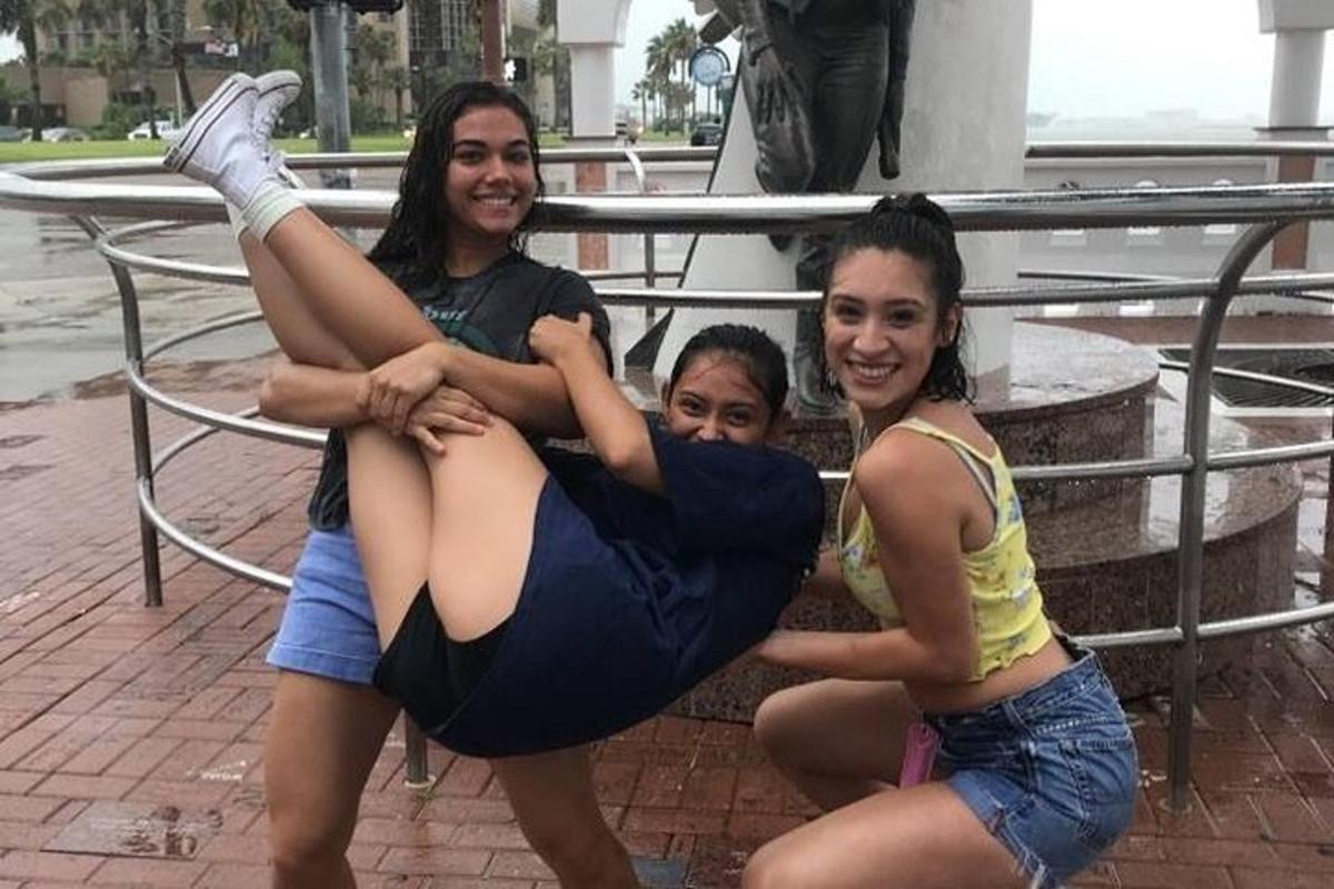 a group of girls posing for a picture