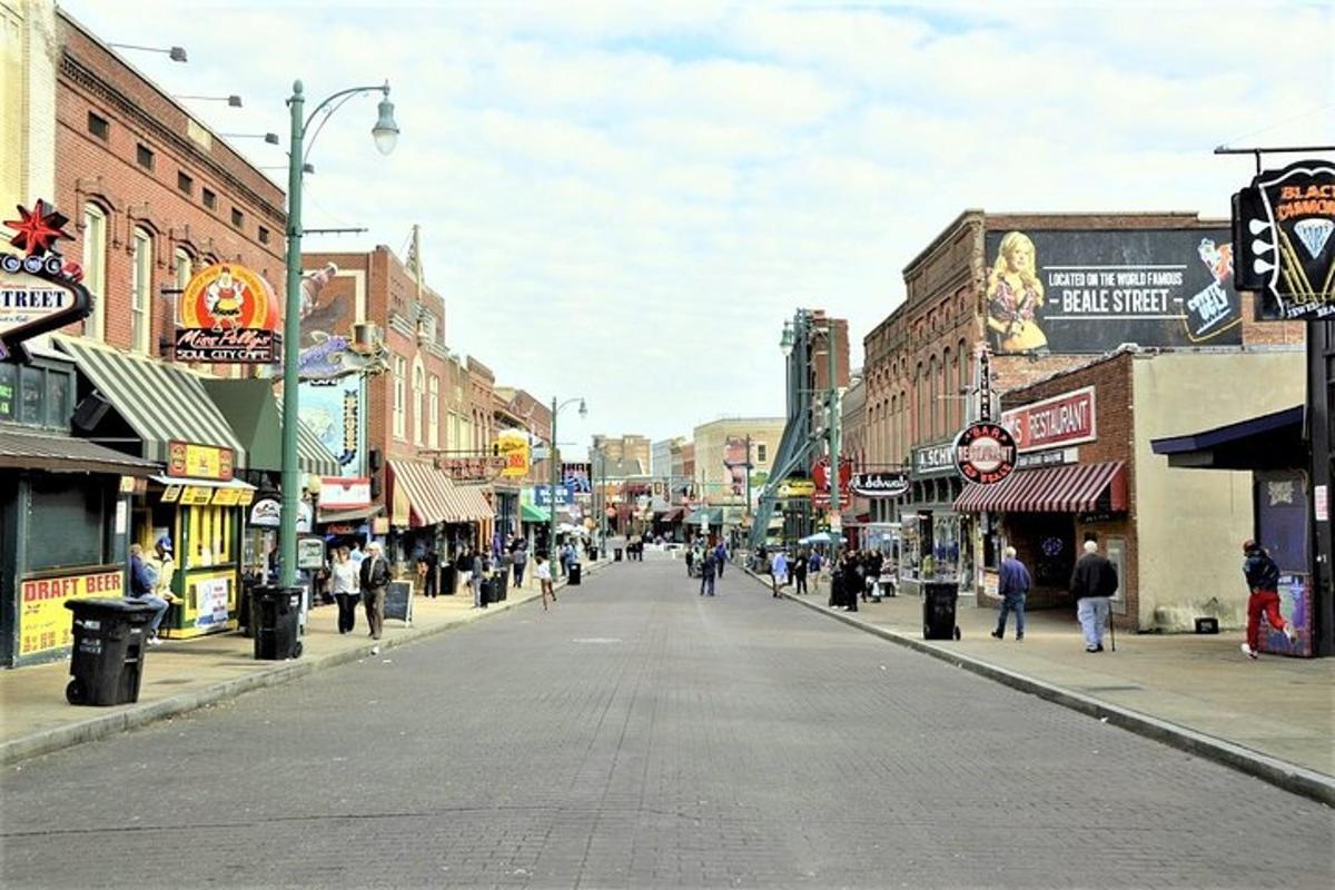 a city street with people walking down the street