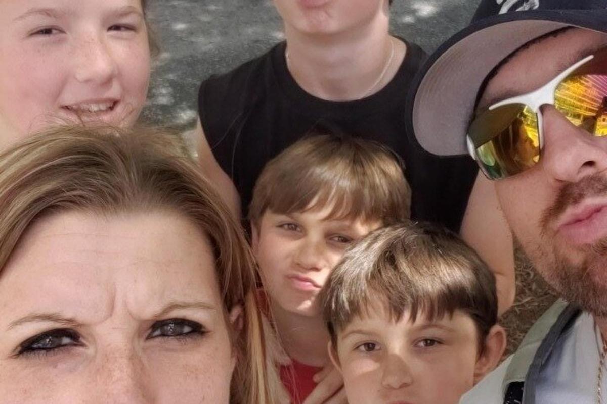 a group of people standing next to each other