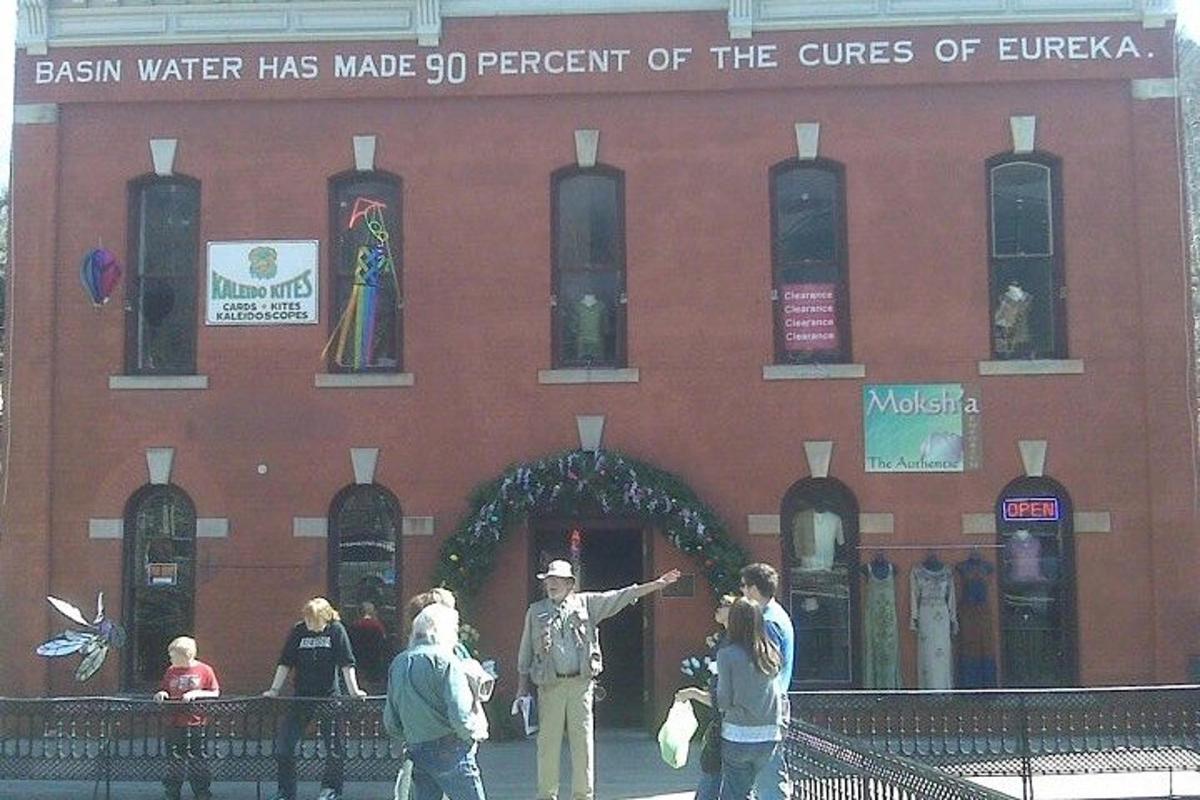 a group of people standing in front of a building