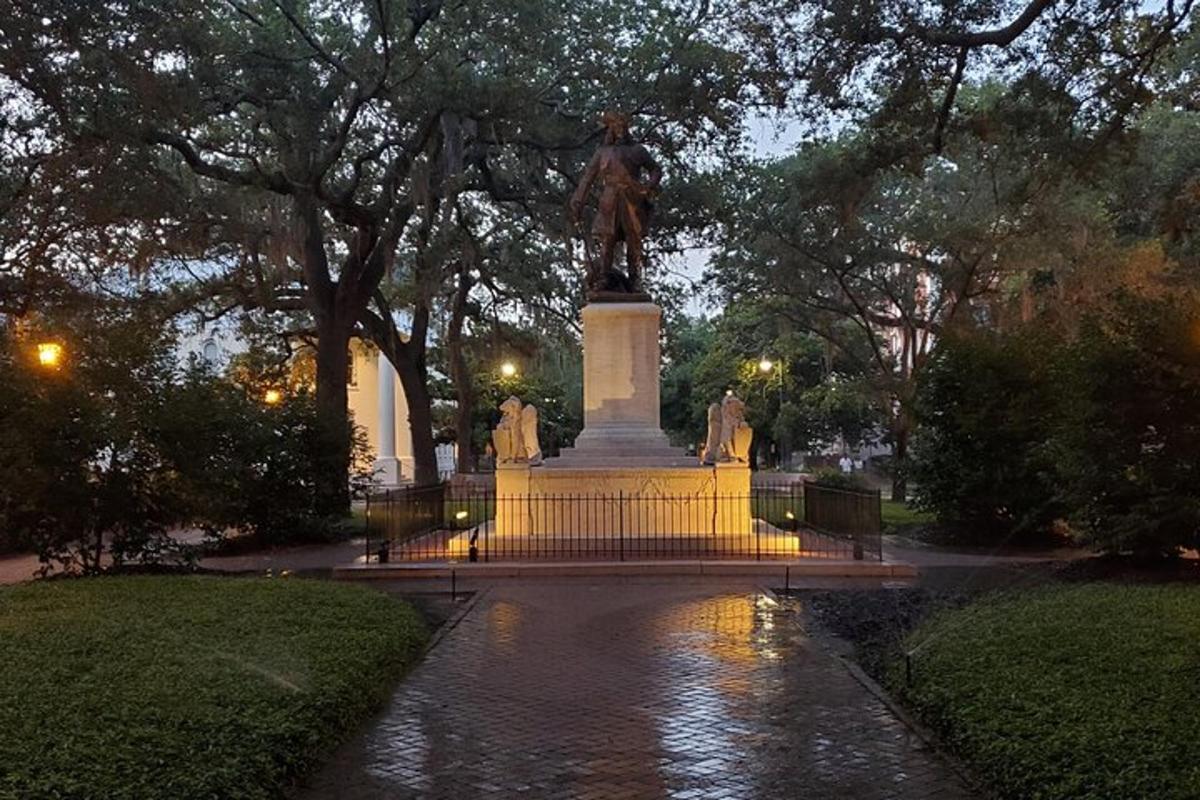 a statue in the middle of a park