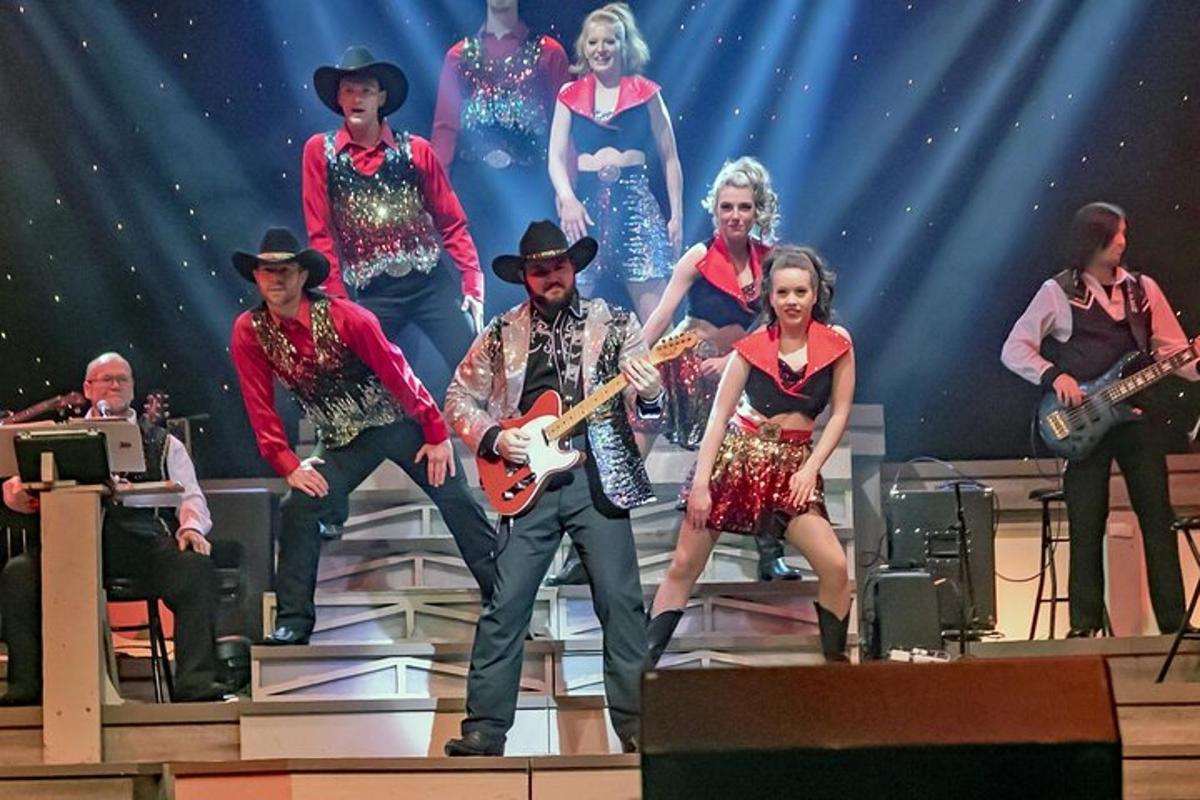 a group of people on a stage playing music
