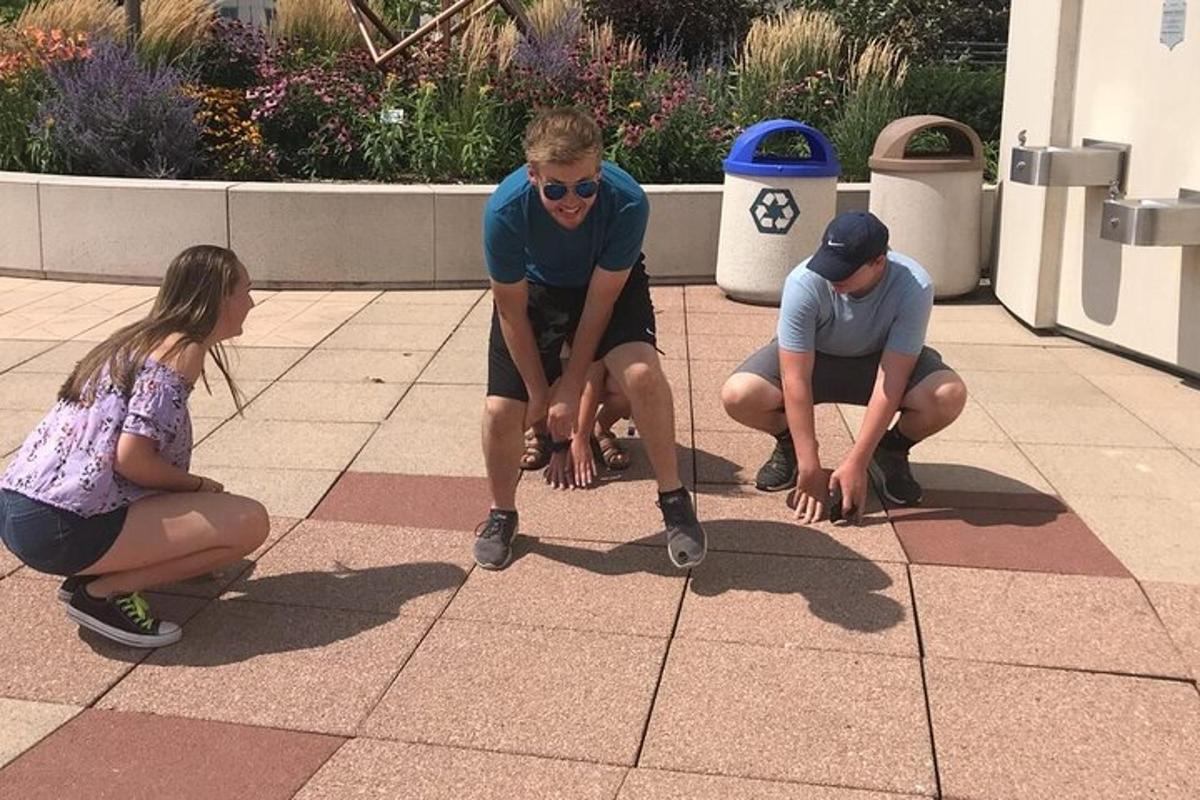 a group of people kneeling on a tile floor