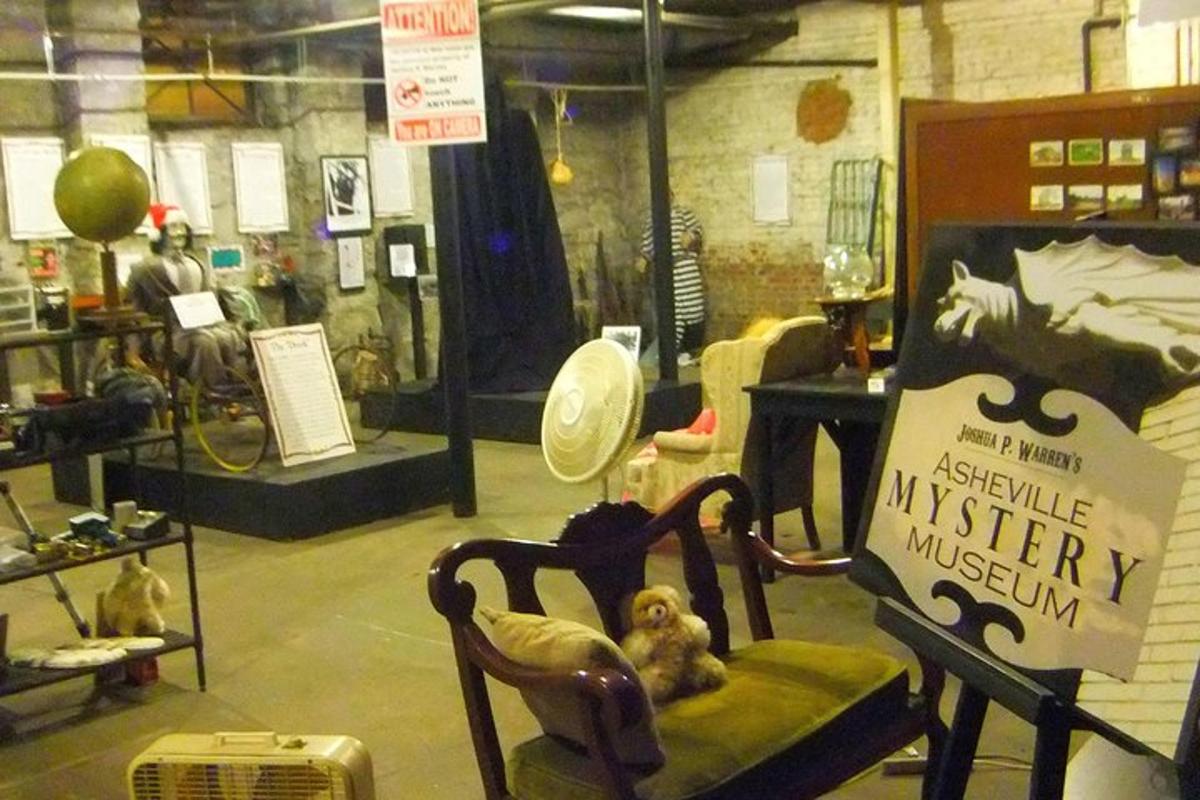 a stuffed animal sitting on a chair in a room