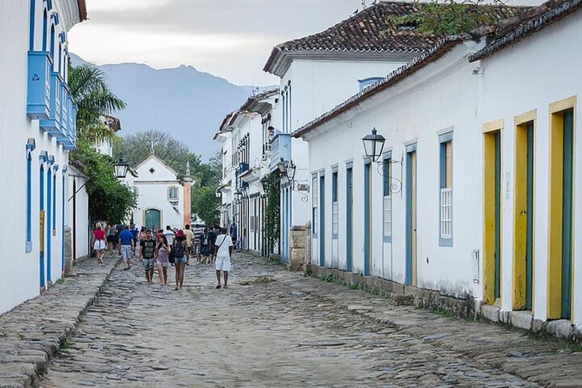 a group of people walking down a street