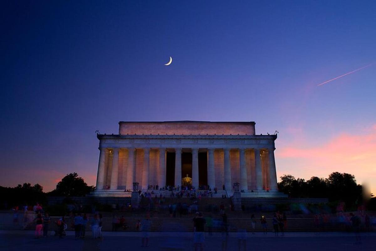 a building with a moon in the sky