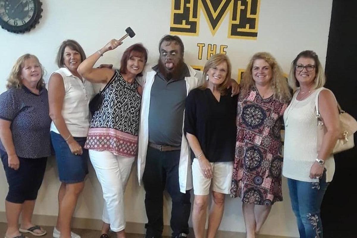 a group of people posing for a picture