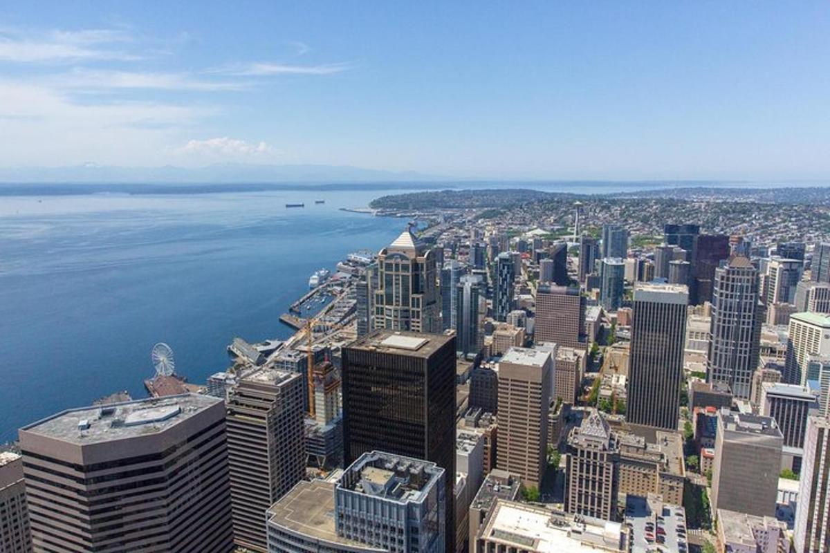 an aerial view of a city and the water