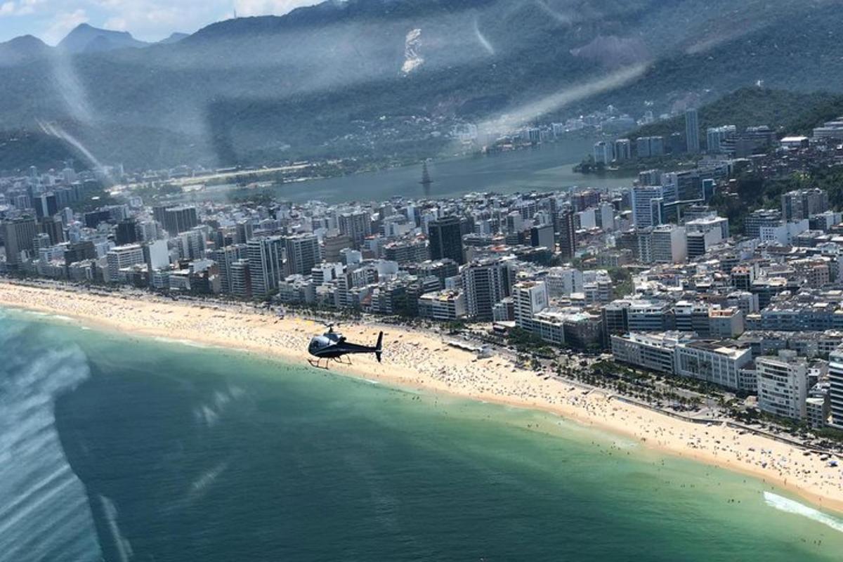 an aerial view of a beach and a city