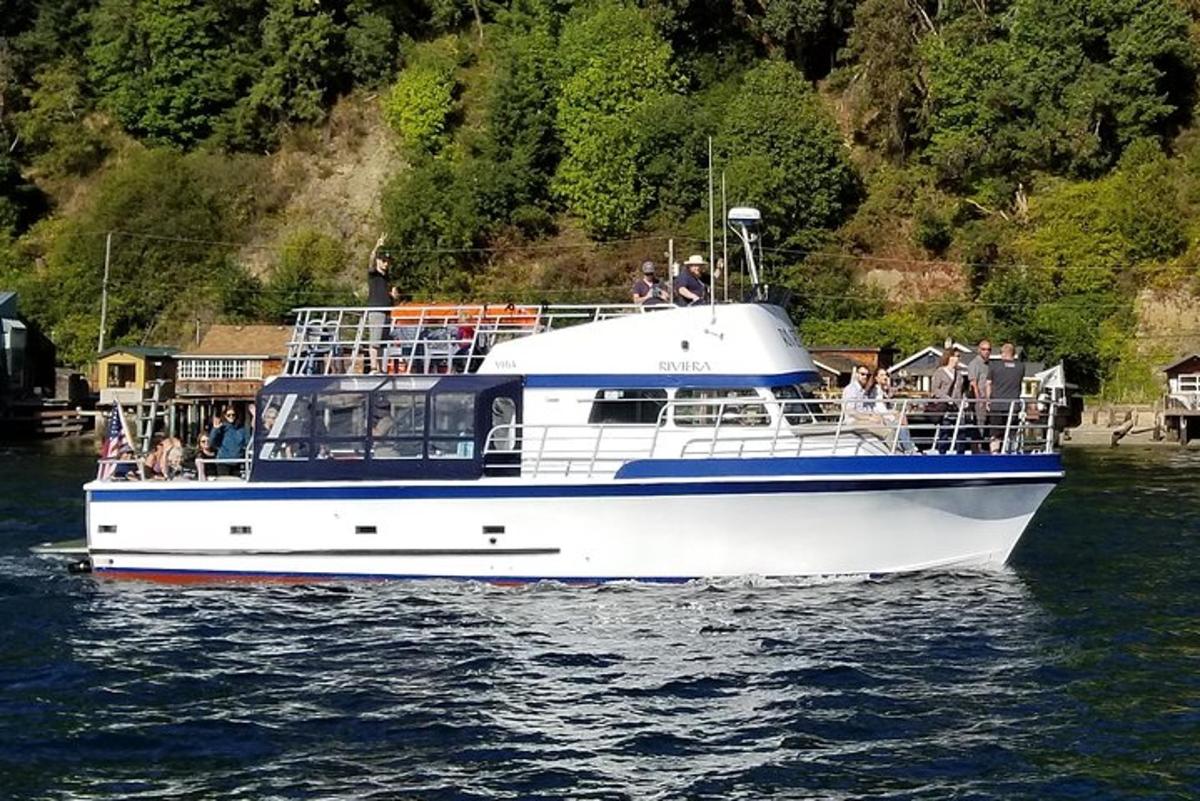a boat with people on it on the water