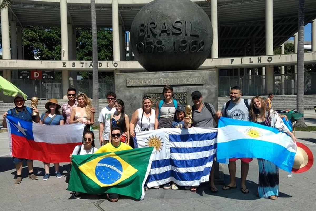 a group of people holding flags in front of a building