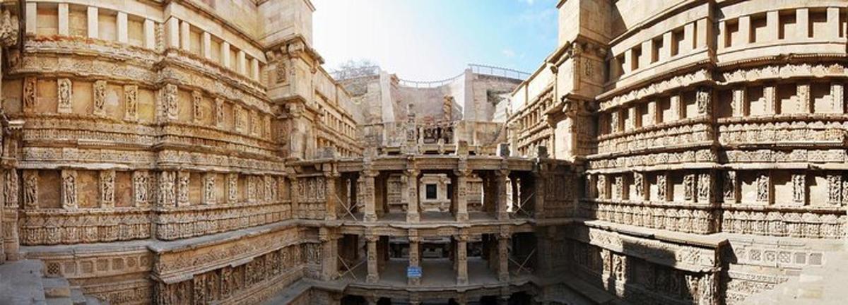 a large building with alot of pillars and windows