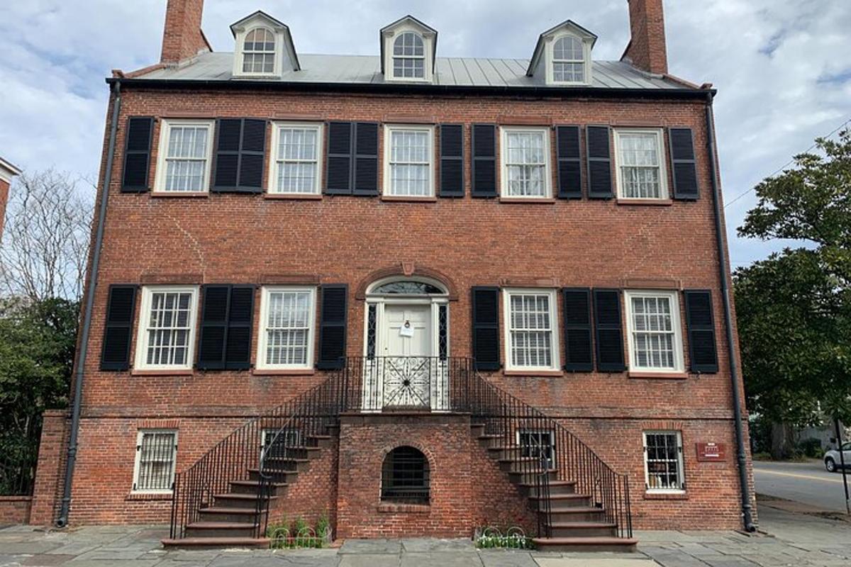 a large red brick building with a white door