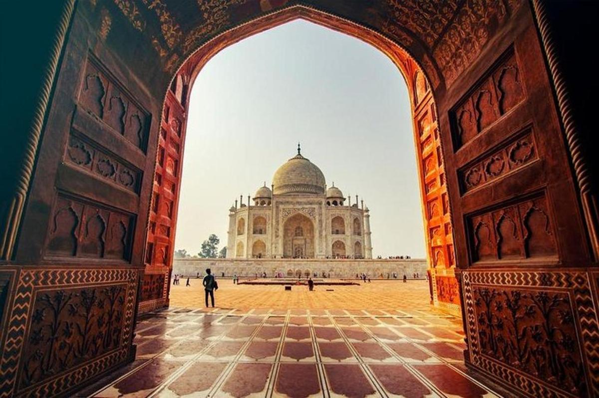 a view of the taj mahal through an archway